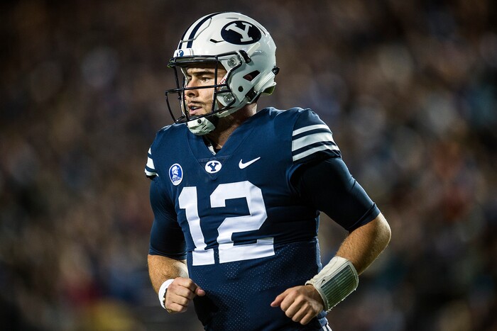 (Chris Detrick  |  The Salt Lake Tribune)  Brigham Young Cougars quarterback Tanner Mangum (12) walks off of the field during the game LaVell Edwards Stadium Friday, October 6, 2017. 