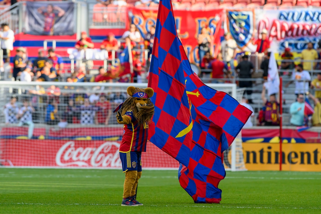 (Tyler Tate | AP) Real Salt Lake mascot Leo the Lion directs the crowd in a cheer before an MLS soccer match between the Vancouver Whitecaps and Real Salt Lake, Saturday, May 24, 2025, in Sandy.