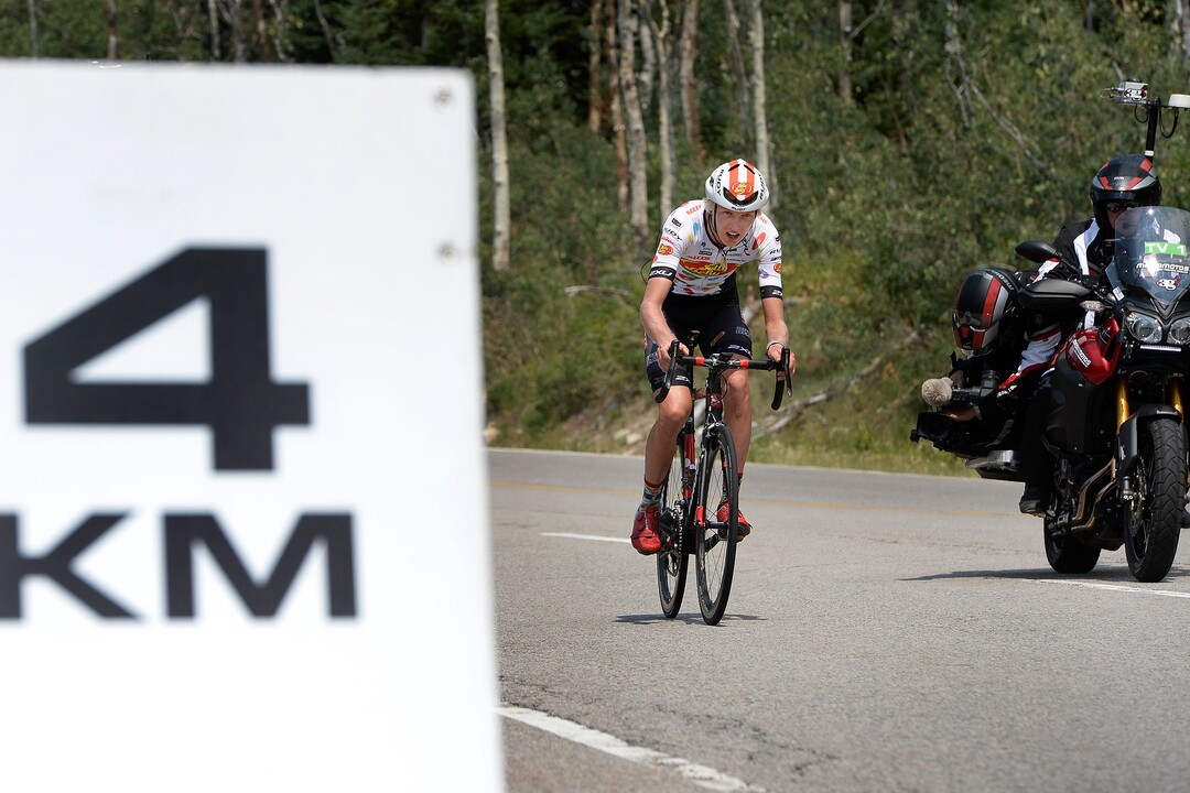 (Scott Sommerdorf   |  The Salt Lake Tribune)   A rider passes the 4 KM to go mark during Stage 3 of the Tour of Utah in Big Cottonwood Canyon, August 2, 2017.  