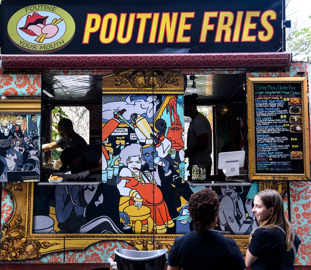 (Steve Griffin  |  The Salt Lake Tribune) Poutine Fries is on of several food trucks at the Urban Arts Festival at the Gallivan Center in Salt Lake City Sunday September 17, 2017. The two day festival featured artists, music, dance performance, automotive arts, projection art, virtual reality and new media arts.