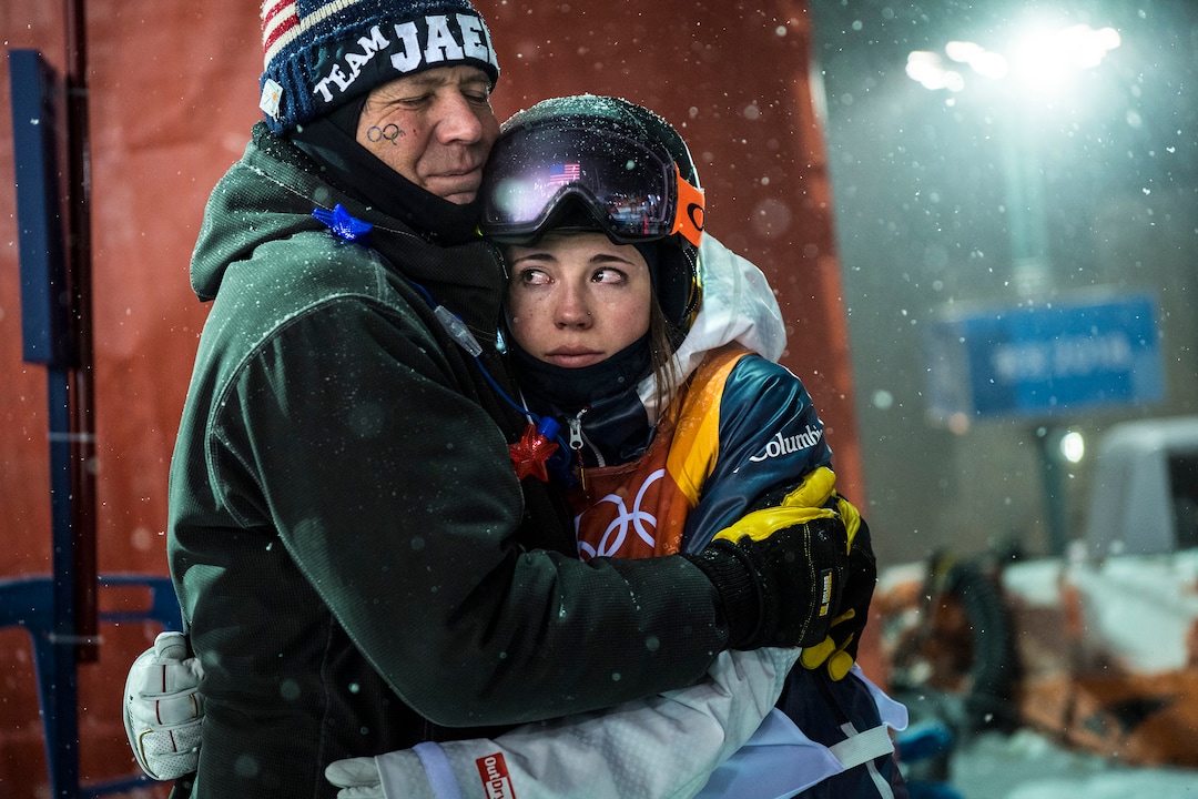 (Chris Detrick  |  The Salt Lake Tribune)  Park City's Jaelin Kauf hugs her step-father Squeak Melehes after competing the Ladies' Moguls Final at Phoenix Park during the Pyeongchang 2018 Winter Olympics Sunday, February 11, 2018. Kauf finished seventh with a score of 76.03.