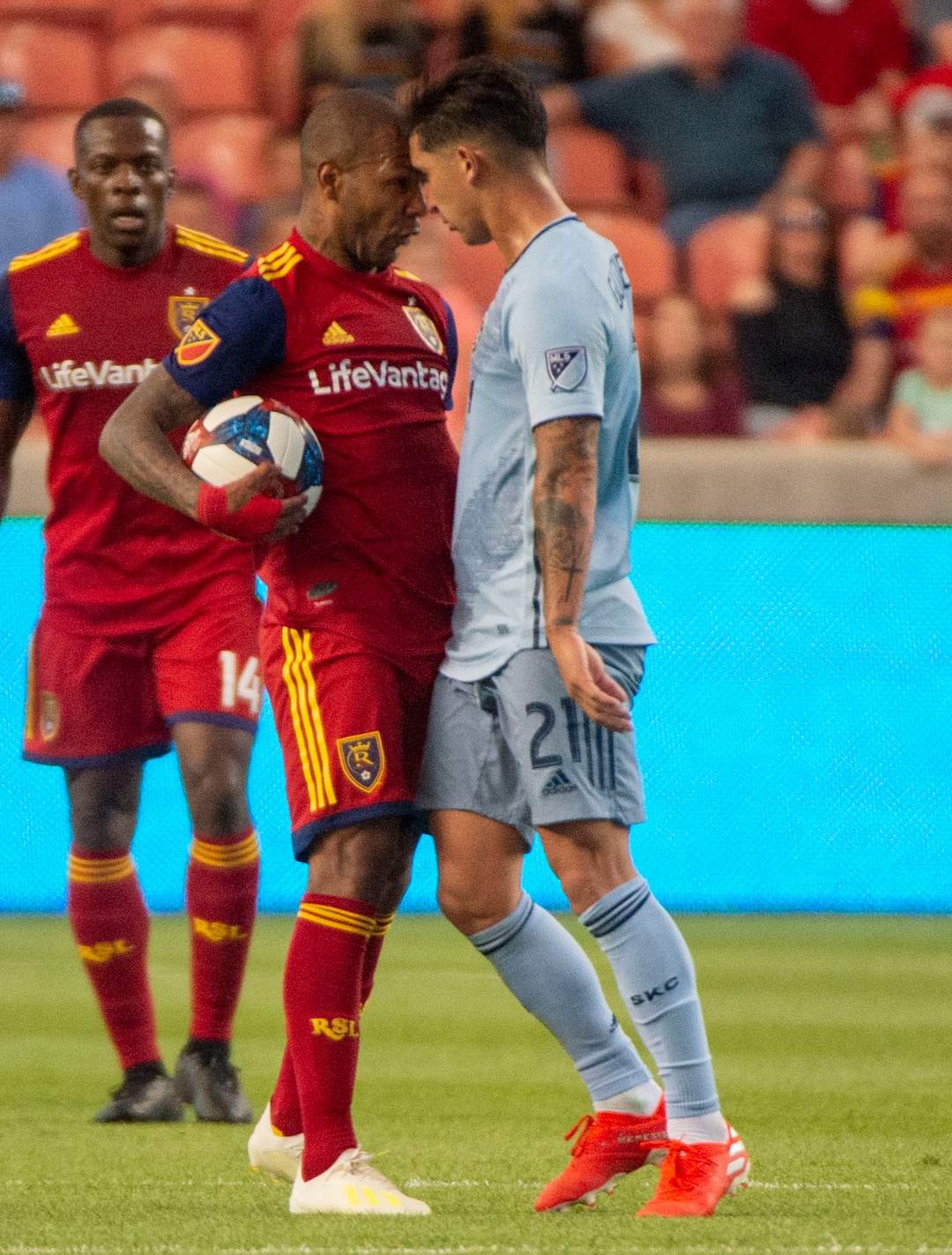 (Rick Egan  |  The Salt Lake Tribune)  Real Salt Lake midfielder Everton Luiz (25) and to Sporting Kansas City midfielder Felipe Gutierrez (21) meet up at midfield, in MLS action between Real Salt Lake and Sporting Kansas City, in Sandy, Saturday, June 29, 2019.