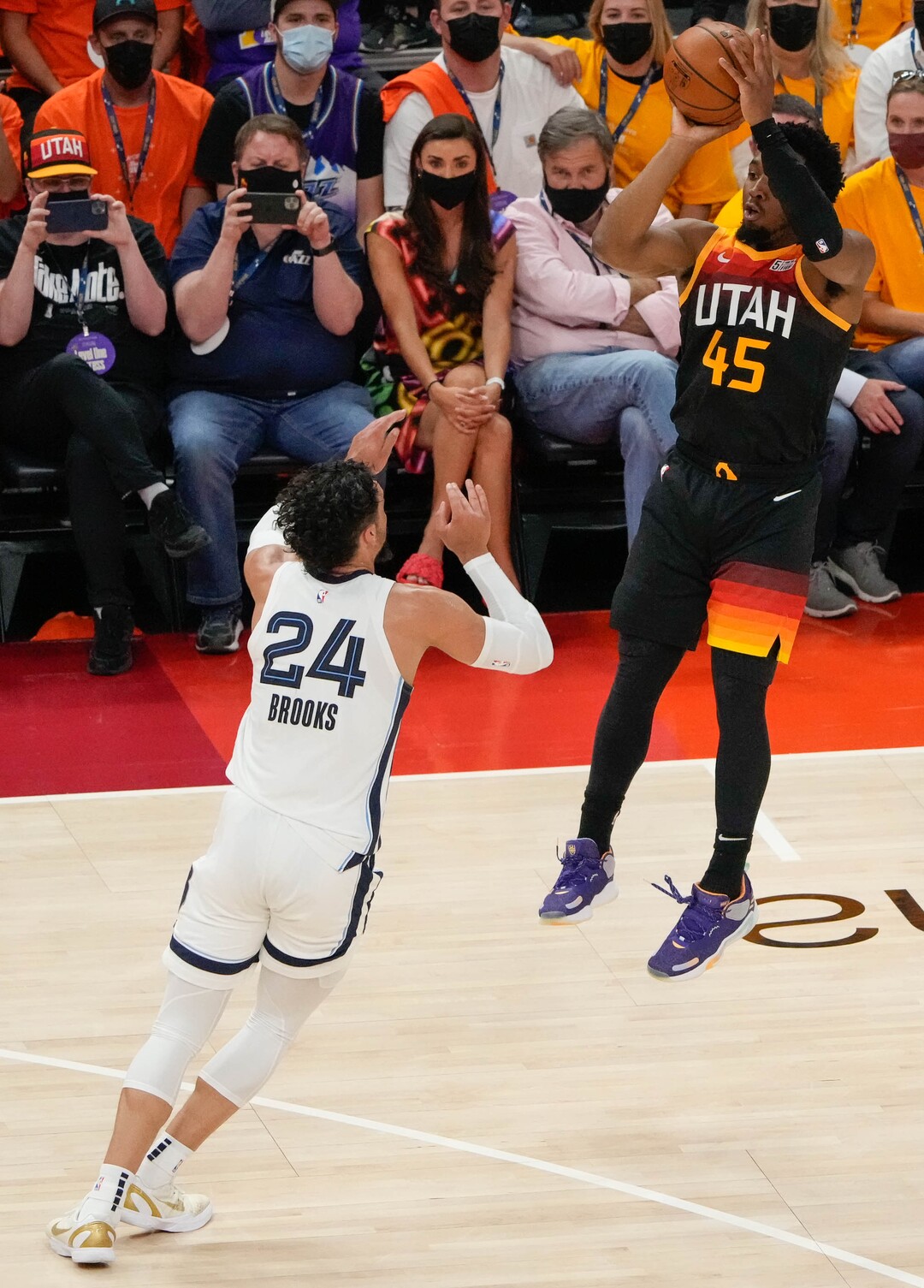 (Francisco Kjolseth | The Salt Lake Tribune) Utah Jazz guard Donovan Mitchell (45) nails the three pointer in the finals seconds of the first half over Memphis Grizzlies forward Dillon Brooks (24) in Game 5 of an NBA basketball first-round playoff series Wednesday, June 2, 2021, in Salt Lake City, UT.