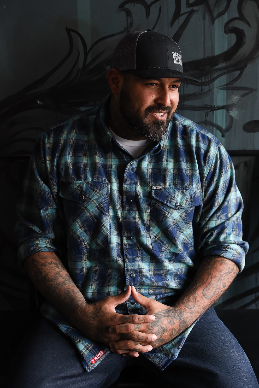 (Francisco Kjolseth  |  The Salt Lake Tribune)  Vincent "Rocco" Vargas a local entrepreneur/actor who's in the cast of the new FX series "Mayans M.C." (which is sort of a continuation of "Sons of Anarchy"), hangs out at his business, Throwbacks Barber Company in Salt Lake City recently as he talks about the arc of his life from a military background to acting. 