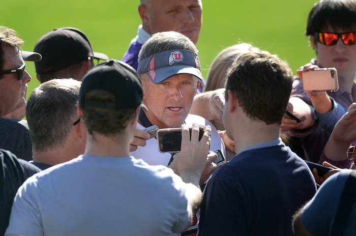 Scott Sommerdorf   |  The Salt Lake Tribune  Utah head coach Kyle Whittingham speaks with a group of reporters after the first day of Utah fall football camp, Friday, July 28, 2017.  