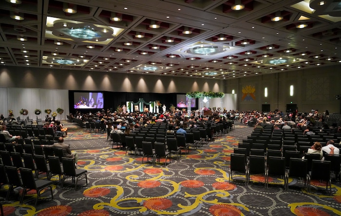 (Bethany Baker  |  The Salt Lake Tribune) People gather during the celebration of life for Afa Ah Loo, the man shot and killed during the 'No Kings' protest, during the community event at the Salt Palace Convention Center in Salt Lake City on Friday, June 27, 2025.