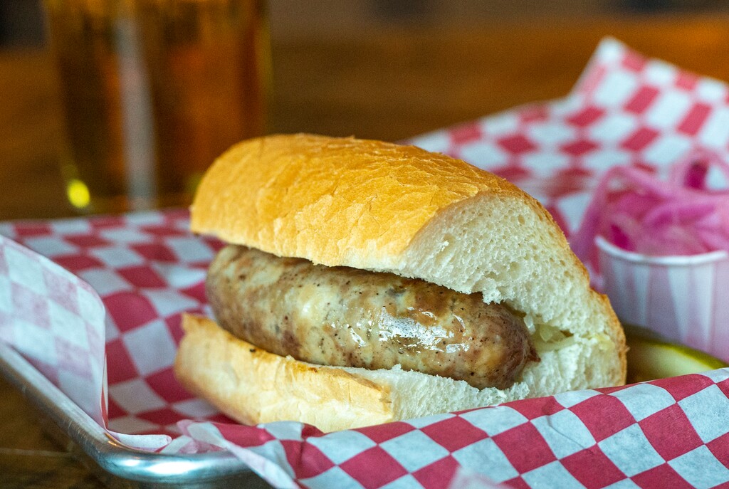 (Rick Egan  |  Tribune file photo) Bratwurst at Bewilder Brewing, a tavern in Salt Lake City whose menu has many kinds of sausages.