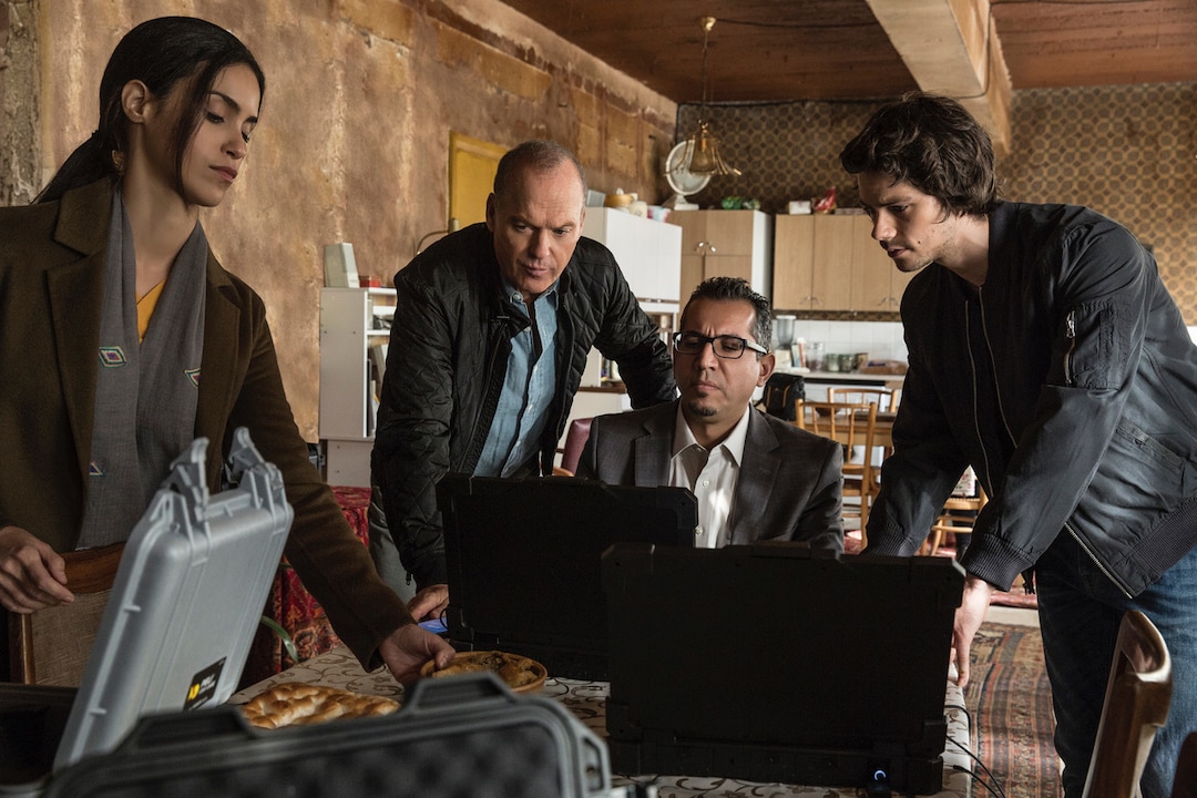 This image released by Lionsgate shows, from left, Shiva Negar, Michael Keaton, Neg Adamson and Dylan O’Brien in a scene from, "American Assassin." (Christian Black/Lionsgate via AP)