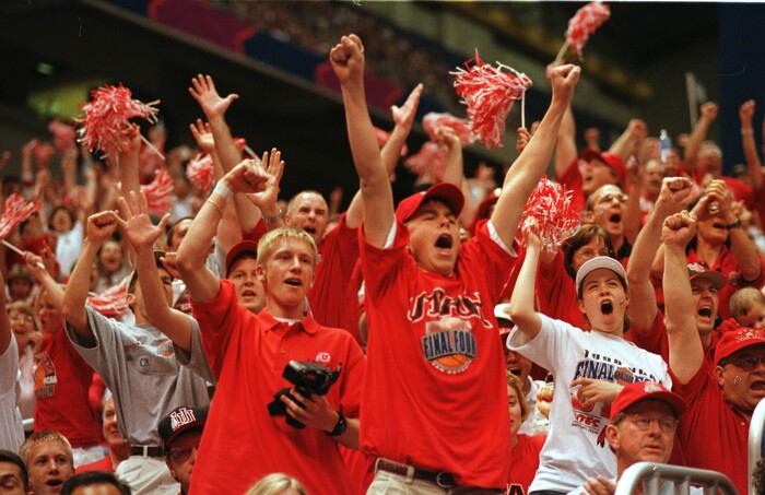 (Trent Nelson  |  Tribune file photo)  Utah fans leap to their feat as the lead hits 15-2 over North Carolina in the 1998 Final Four in San Antonio, Texas.