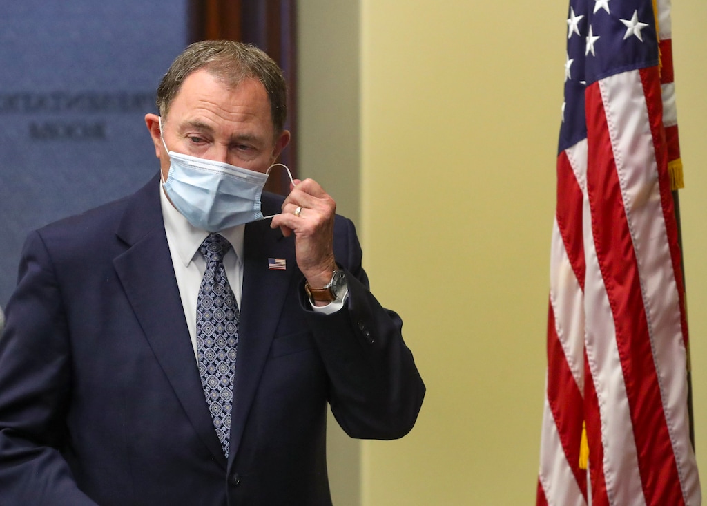 (Steve Griffin | Deseret News, pool) Utah Gov. Gary Herbert takes off his mask before speaking during the daily briefing on the state's efforts to fight COVID-19 Wednesday, June 24, 2020, in Salt Lake City.