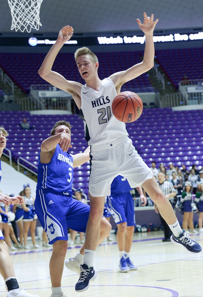 (Leah Hogsten  |  The Salt Lake Tribune) Copper Hills' Joseph Wilson (21) had 5 rebounds and 5 points in the first half.  Copper Hills faces Bingham in the 6A High School Boys' Basketball Tournament opening game at Weber State University’s Dee Events Center in Ogden, Tuesday, Feb. 27, 2018. 
