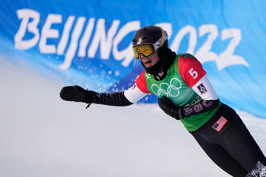 (Lee Jin-man | AP) United States' Lindsey Jacobellis celebrates after winning a gold medal in the women's cross at the 2022 Winter Olympics, Wednesday, Feb. 9, 2022, in Zhangjiakou, China.