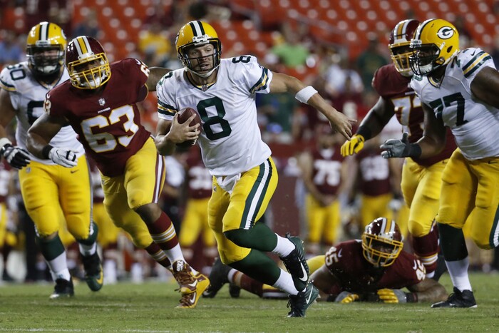 Green Bay Packers quarterback Taysom Hill (8) carries the ball toward the end zone for a touchdown during the second half of an NFL preseason football game against Washington in Landover, Md., Saturday, Aug. 19, 2017. (AP Photo/Alex Brandon)