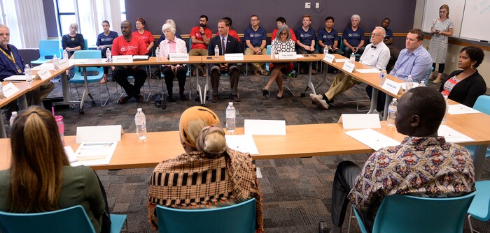 (Al Hartmann | The Salt Lake Tribune)
Rep. Chris Stewart, center-top holds a roundtable discussion with refugees and local agencies at Salt Lake Community College's Medowbrook campus in South Salt Lake Tuesday August 22.