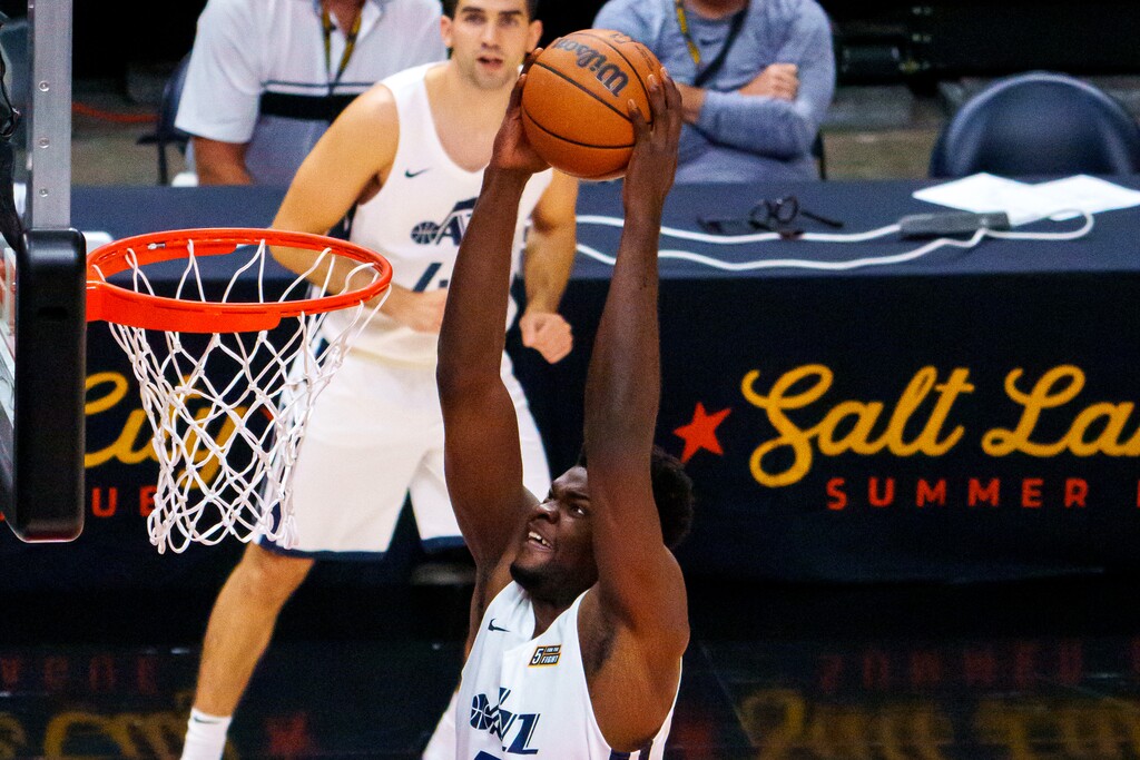 (Trent Nelson  |  The Salt Lake Tribune) Utah Jazz White center Udoka Azubuike (20) dunks the ball as Utah Jazz Blue faces Utah Jazz White in the Salt Lake City Summer League in Salt Lake City on Friday, Aug. 6, 2021.