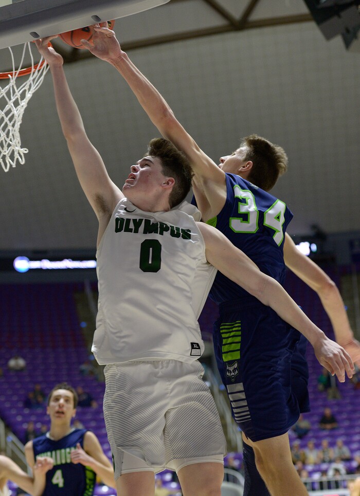 Leah Hogsten | The Salt Lake Tribune
Olympus' Jeremy Dowdell is fouled by Timpanogos' Derik Eaquinto. Olympus High School defeated Timpanogos High School 91-69 during their 4A State boys’ basketball quarterfinal playoff game at Weber State University's Dee Events Center, Thursday, March 2, 2017.