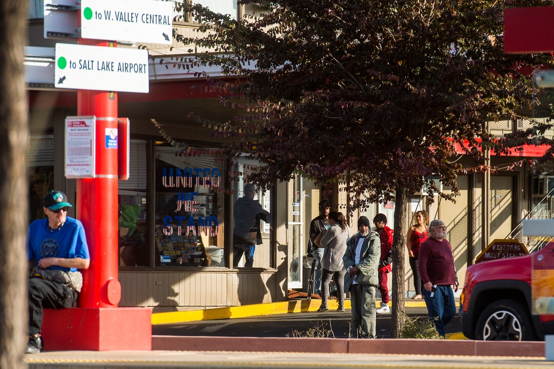 (Chris Detrick  |  The Salt Lake Tribune)  People outside of Gateway Inn 819 West North Temple in Salt Lake City Tuesday, October 17, 2017. 