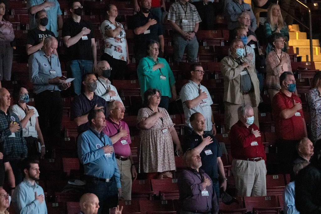 (Francisco Kjolseth | The Salt Lake Tribune) Delegates recite the Pledge of Allegiance as they attend the Utah Republican Party’s 2021 Organizing Convention at the Maverik Center in West Valley City on Saturday, May 1, 2021. The pandemic had forced the nominating convention to be held online last year.