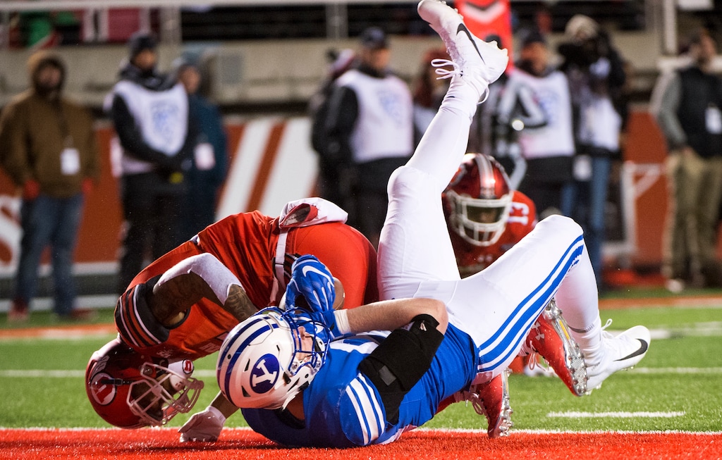(Rick Egan  |  The Salt Lake Tribune)      Brigham Young tight end Matt Bushman (89) lands in the end zone for a Cougar touchdown, in football action between the Brigham Young Cougars and the Utah Utes, at Rice-Eccles Stadium, Saturday, November 24, 2018.