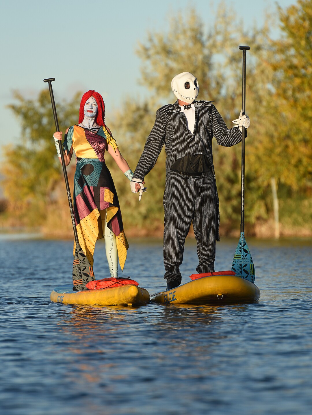 (Francisco Kjolseth  |  The Salt Lake Tribune)  Stand up paddle board enthusiasts Roxy Christensen and Chris Knoles take to the water at Bountiful Pond on Tuesday, Oct. 30, 2018, in what has become a Halloween tradition for the 4th year in a row as they dressed up this year as Jack and Sally Skellington from the movie Nightmare Before Christmas. "We paddle year round but actually paddle more in the winter," exclaimed Knoles, who carry the tradition on at Christmas, dressing up in something festive and paddling on the Great Salt Lake where the high salinity usually keeps the water from freezing.