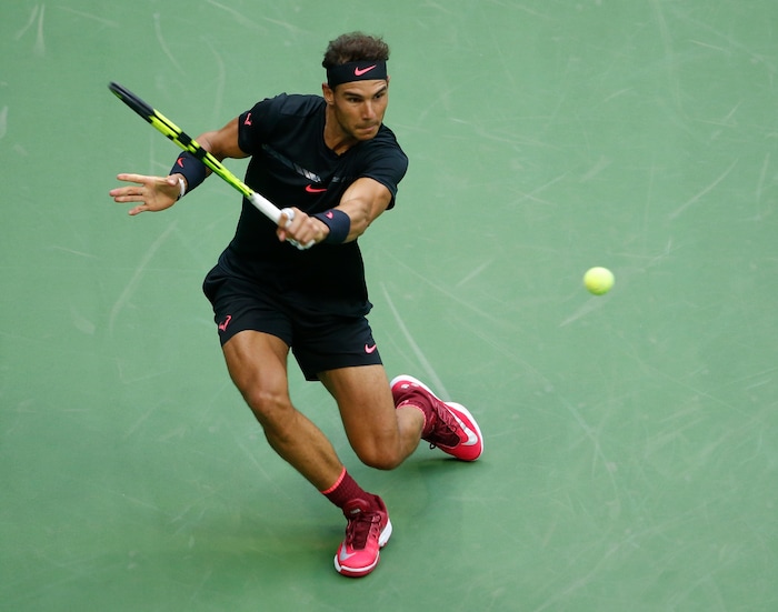 Rafael Nadal, of Spain, returns a shot from Kevin Anderson, of South Africa, during the men's singles final of the U.S. Open tennis tournament, Sunday, Sept. 10, 2017, in New York. (AP Photo/Seth Wenig)