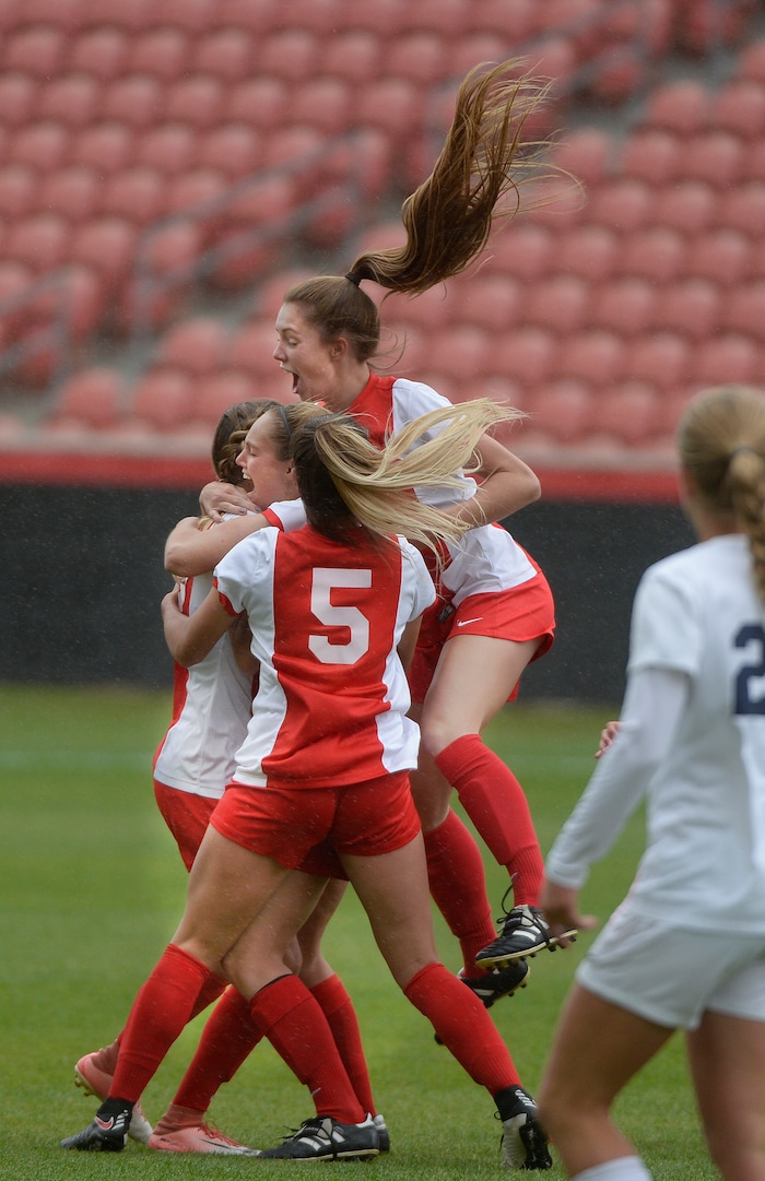 (Scott Sommerdorf   |  The Salt Lake Tribune)   American Fork's Jamie Shepherd jumps to celebrate the equalizing goal by team mate Josie Shepherd. American Fork beat Syracuse 3-1 to win the 6A championship game played at Rio Tinto, Friday, October 20, 2017. 