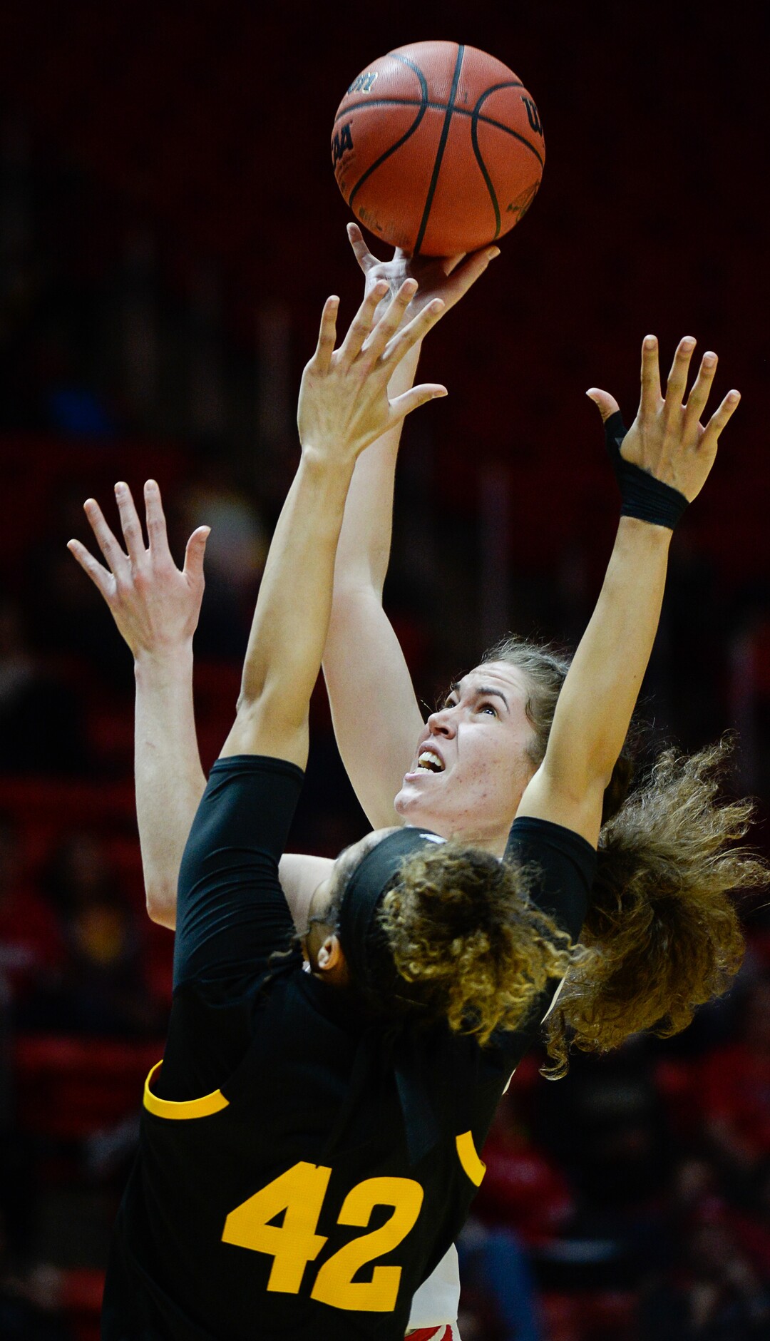 (Francisco Kjolseth  |  The Salt Lake Tribune)  Utah Utes forward Megan Huff (5) sails one in past Arizona State Sun Devils forward Kianna Ibis (42) in Utes' Pac-12 home opener at the Jon M Huntsman Center on Friday, Jan. 4, 2019. They're off to one of their best starts in team history.
