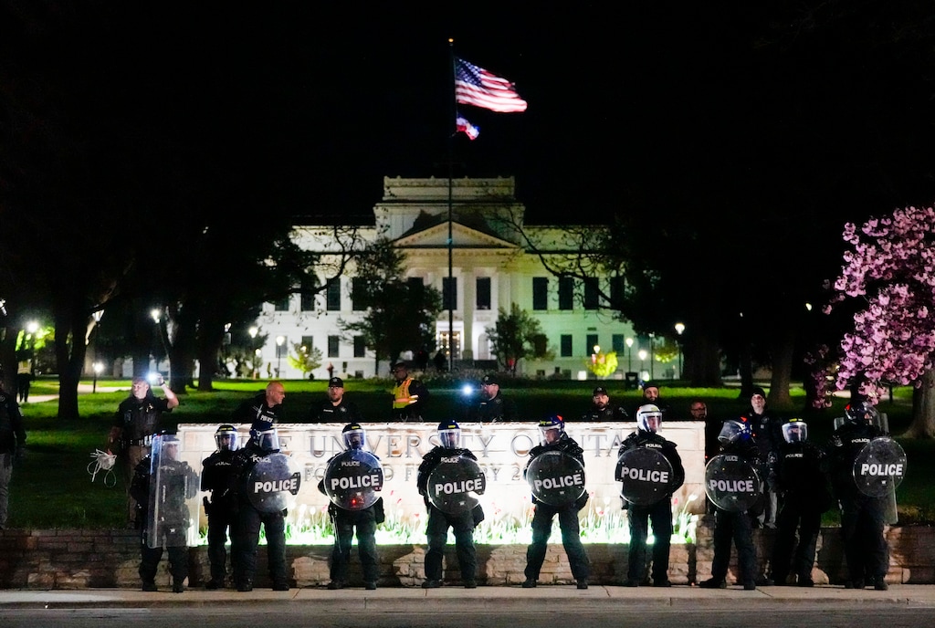 (Bethany Baker  |  The Salt Lake Tribune) Law enforcement stand in front of the University of Utah sign during the pro-Palestine rally at the University of Utah in Salt Lake City on Monday, April 29, 2024.
