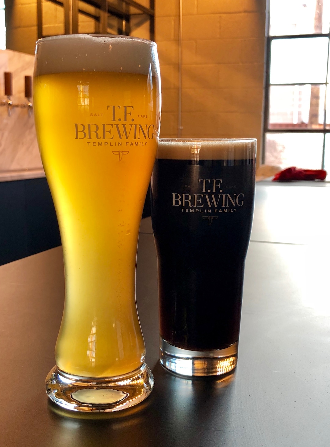 (Courtesy Photo) An American Wheat Ale and the My Son Porter at T.F. Brewing, which opened last week in Salt Lake City.