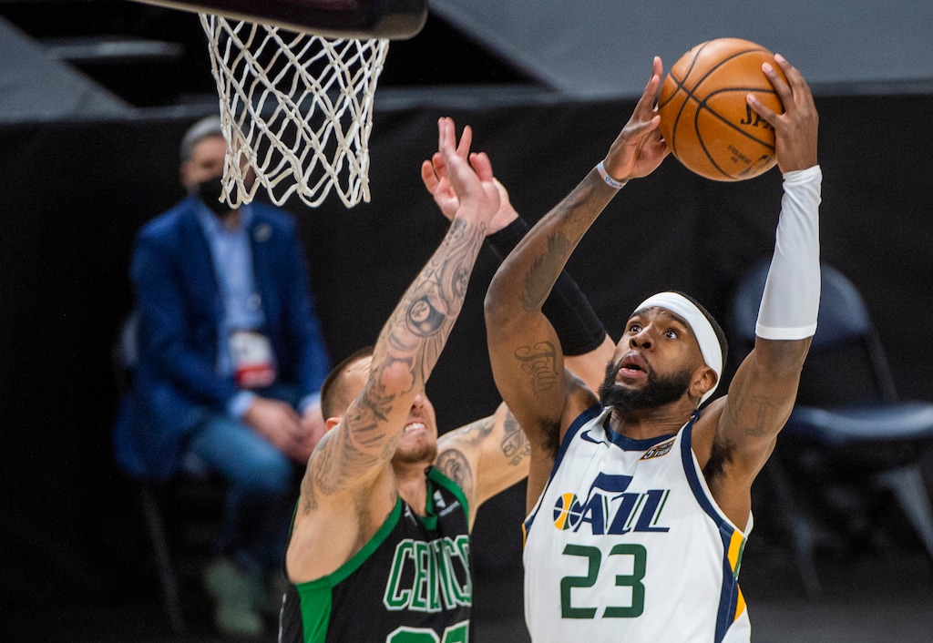  (Rick Egan | The Salt Lake Tribune) Utah Jazz forward Royce O'Neale (23) takes the ball to the hoop, as Boston Celtics center Daniel Theis (27) defends, in NBA action between the Utah Jazz and the Boston Celtics, at Vivint Arena, on Tuesday, Feb. 9, 2021.