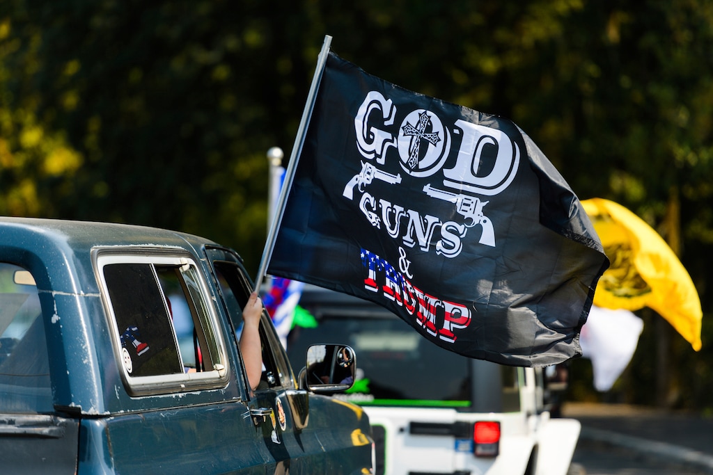 (Michael Arellano | AP) The "Oregon for Trump 2020 Labor Day Cruise Rally" at Clackamas Community College in Oregon City, Ore., Sept. 7, 2020. Gun ownership is a question that has dogged Christians for years, but conservative Christians are increasingly answering “yes.”