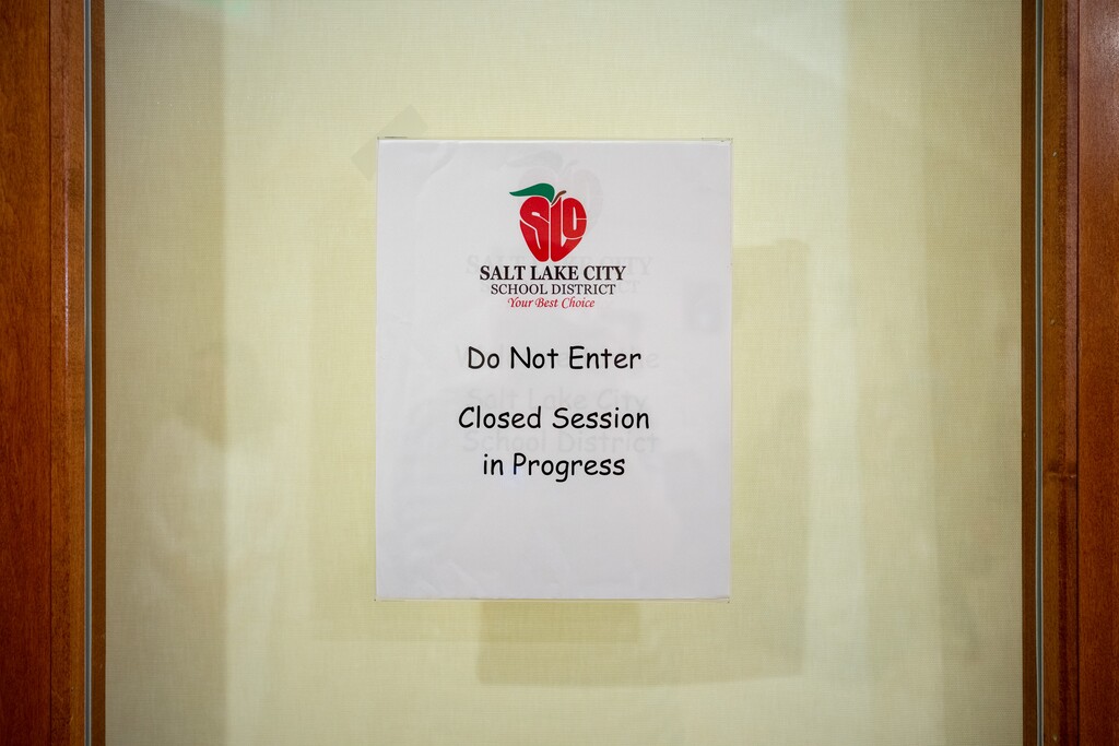 (Trent Nelson  |  The Salt Lake Tribune) A sign indicates that the Salt Lake City School District Board is in a closed session on Tuesday, Aug. 2, 2022.