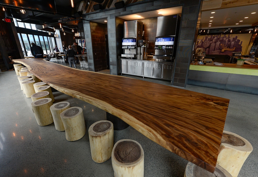(Francisco Kjolseth  |  The Salt Lake Tribune)   The Gateway is getting a new food hall called HallPass and will be operated by SkinnyFATS, a Las Vegas-based restaurant. Featuring long communal tables made from acacia wood, and murals by artist Donovan Fitzgerald, it features different food options. The Hall also has a full service liquor license which means customers can get beer, wine and spirits if they order food.
