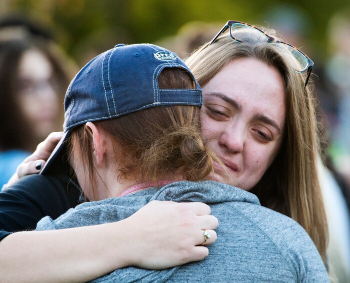 (Rick Egan  |  The Salt Lake Tribune) Jamie Blaase hugs  hugs Hannah Moyer, during a candle light vigil for the victims of the Lad Vegas shooting, at Southern Utah University in Cedar City, Wednesday, October 4, 2017.