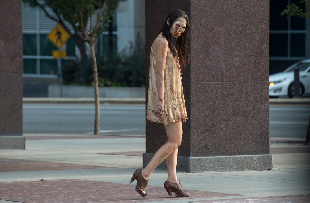    (Rick Egan  |  The Salt Lake Tribune)       McKayl walks along 300 South, during the 11th annual Salt Lake Zombie Walk, Sunday, Aug. 26, 2018.
