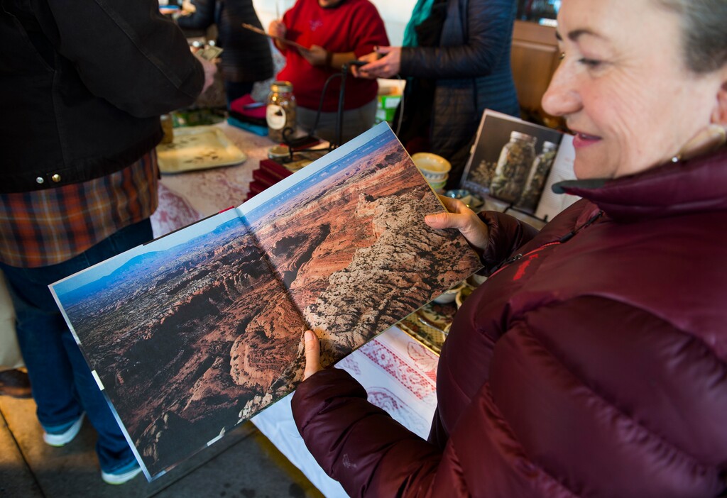 (Scott Sommerdorf   |  The Salt Lake Tribune)   Blake Spalding, co-owner of Hell's Backbone Grill in Boulder, shows a double truck photo from the new cookbook, "This Immeasurable Place: Food and Farming from the Edge of Wilderness," December 9, 2017.  