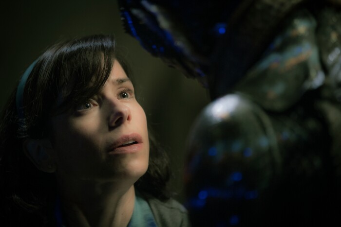 This image released by Fox Searchlight Pictures shows Sally Hawkins, left, and Doug Jones in a scene from the film "The Shape of Water." Guillermo del Toro’s Cold War fantasy tale received two awards from the Utah Film Critics Association, for Hawkins' performance and for Alexandre Desplat's score.. (Kerry Hayes/Fox Searchlight Pictures via AP)