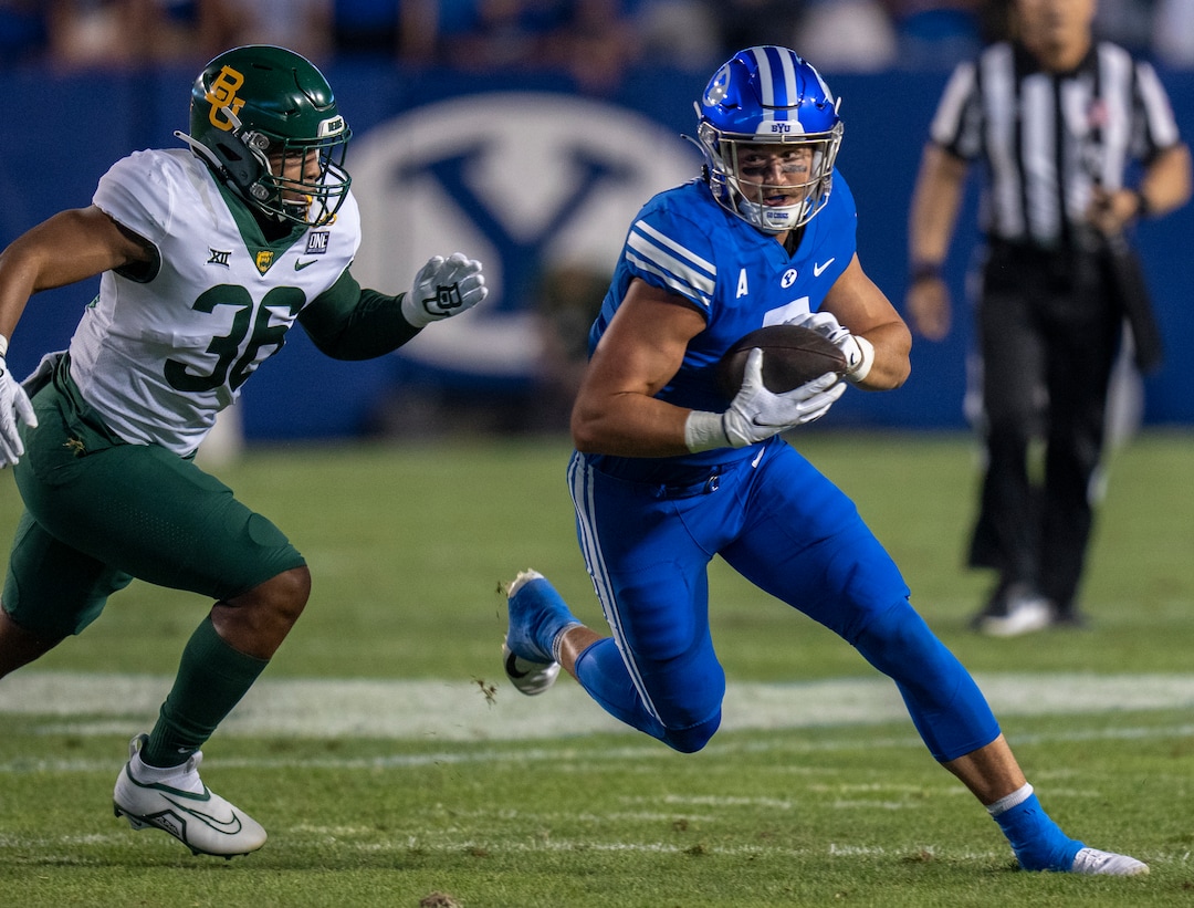 (Rick Egan | The Salt Lake Tribune)  Baylor Bears linebacker Tyrone Brown (36) chases Brigham Young Cougars tight end Dallin Holker (5), in football action between the Brigham Young Cougars and the Baylor Bears at LaVell Edwards Stadium in Provo, on Saturday, Sept. 10, 2022.