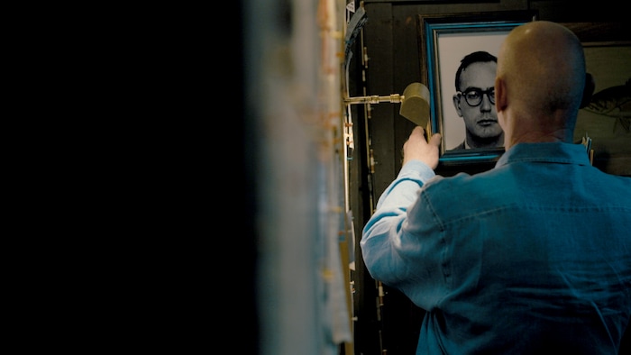 (Photo courtesy of FX) Gary L. Stewart holds a photo of his biological father, Earl Van Best Jr.