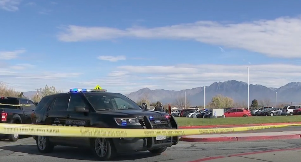 (Fox 13 News) West Jordan police investigate an apparent stabbing in the parking lot of Copper Hills High School on Thursday, Nov. 2, 2023, in this screenshot of Fox 13 News coverage. The Salt Lake Tribune and Fox 13 News are content-sharing partners.