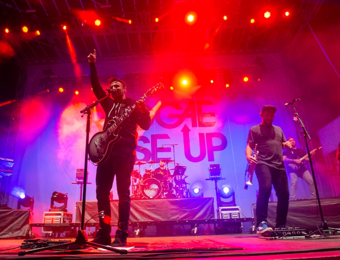 (Rick Egan  |  The Salt Lake Tribune)   Eric Rachmany gets the crowd going as Rebellion plays the main stage of the Regge Rise Up Music Festival at the Rivers Edge near Heber City, Friday, Aug. 23, 2019.