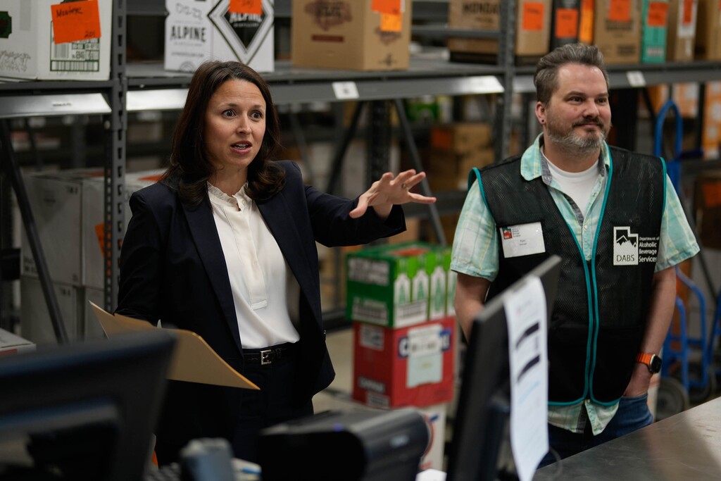 (Francisco Kjolseth  |  The Salt Lake Tribune) Tiffany Clason, Executive Director of the State of Utah Alcoholic Beverage Control, joins Ryan Hill, store manager for the Park City Club liquor store, for a tour and recognition of those who helped following a roof collapse last year from heavy snow on Thursday, April 25, 2024.