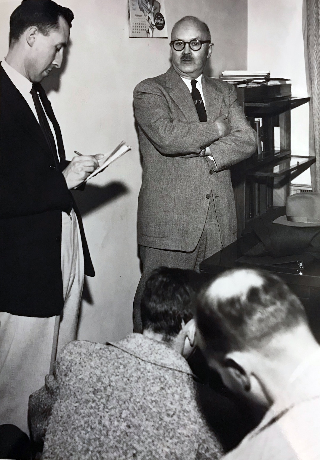 (Tribune file photo)  Members of the press are given Sen. Shoemaker's statement. H.C. Shoemaker is facing the camera. Vera Johnson Black's children were placed in state custody after the 1953 raid on Short Creek, which lead to a Utah Supreme Court case.