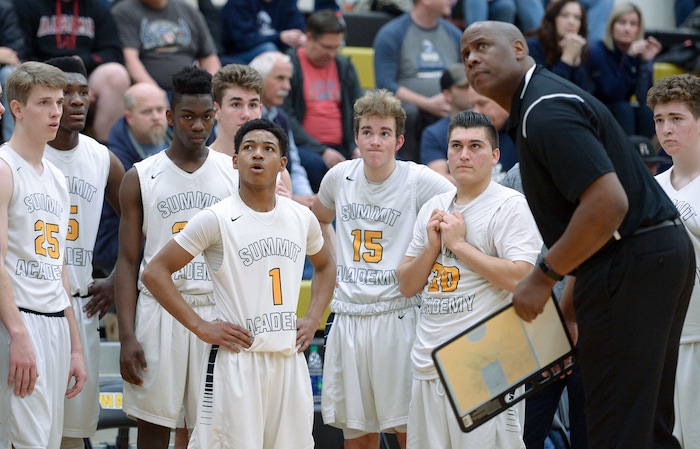 (Leah Hogsten  |  The Salt Lake Tribune) Summit looks to the scoreboard during a time out in overtime. Juab High School boys' basketball team defeated Summit Academy 61-58 in overtime during their 3A State tournament game in Heber  Saturday, Feb. 16, 2018.