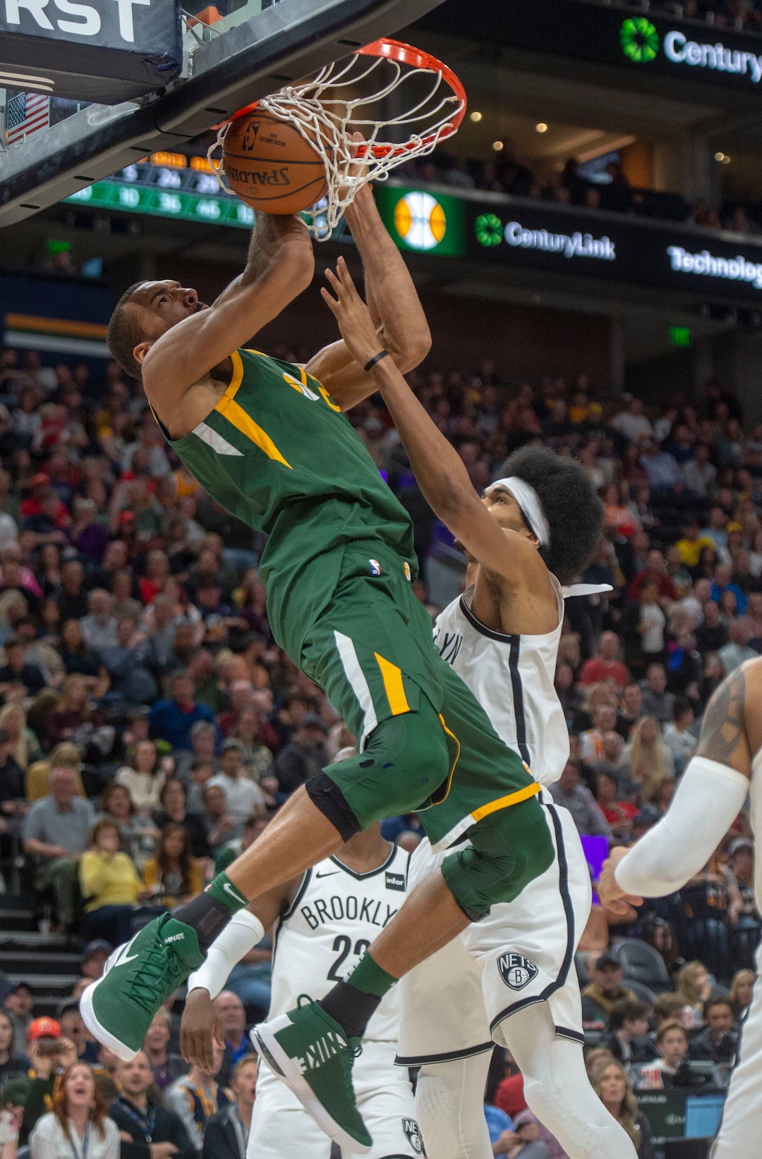 (Rick Egan  |  The Salt Lake Tribune)   Utah Jazz center Rudy Gobert (27) dunks the ball over Brooklyn Nets center Jarrett Allen (31) in NBA action between Utah Jazz and Brooklyn Nets at Vivint Smart Home Arena, Saturday, March 16, 2019.