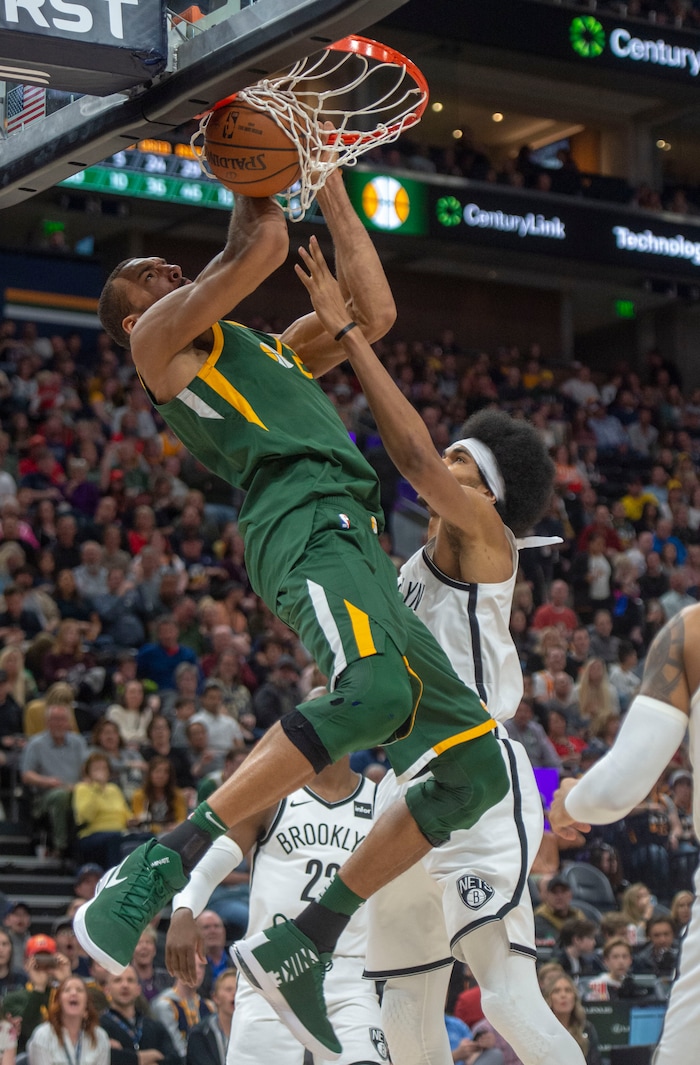 (Rick Egan  |  The Salt Lake Tribune)   Utah Jazz center Rudy Gobert (27) dunks the ball over Brooklyn Nets center Jarrett Allen (31) in NBA action between Utah Jazz and Brooklyn Nets at Vivint Smart Home Arena, Saturday, March 16, 2019.


