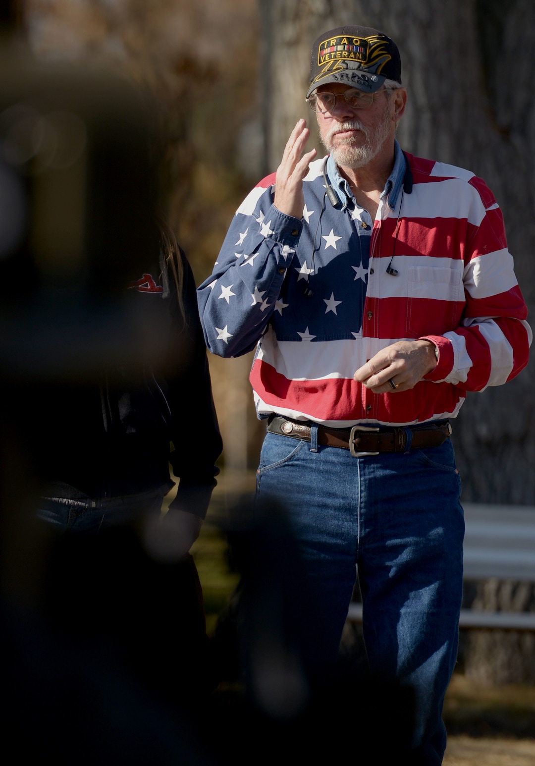 (Leah Hogsten  |  The Salt Lake Tribune)  Operation Desert Storm and Operation Iraqi Freedom Army Veteran Barney Johnson salutes fellow veterans as they pass during Northern Utah’s 12th Annual Veterans Day Parade Saturday, Nov. 11, 2017 in Layton.