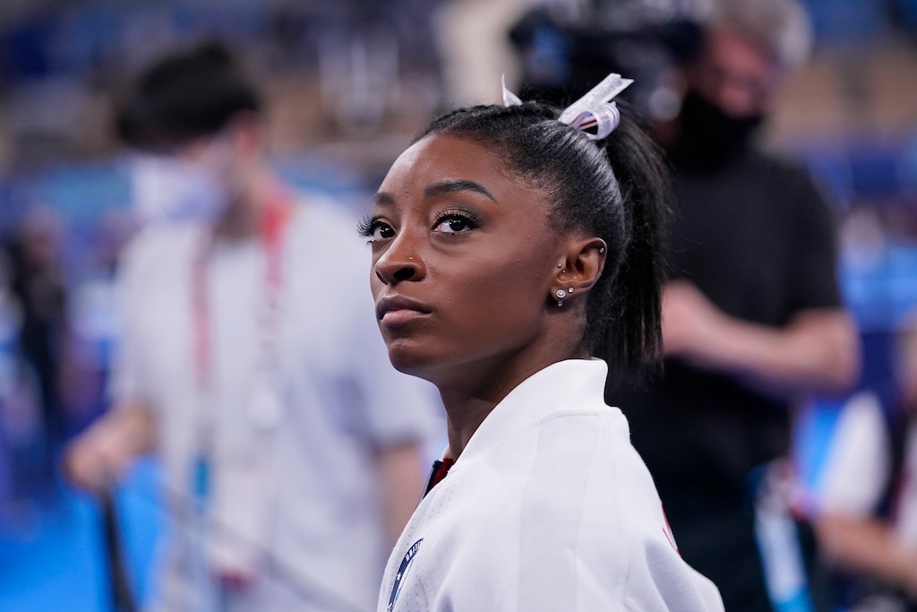 (Gregory Bull | AP) Simone Biles, of the United States, waits for her turn to perform during the artistic gymnastics women's final at the 2020 Summer Olympics, Tuesday, July 27, 2021, in Tokyo.