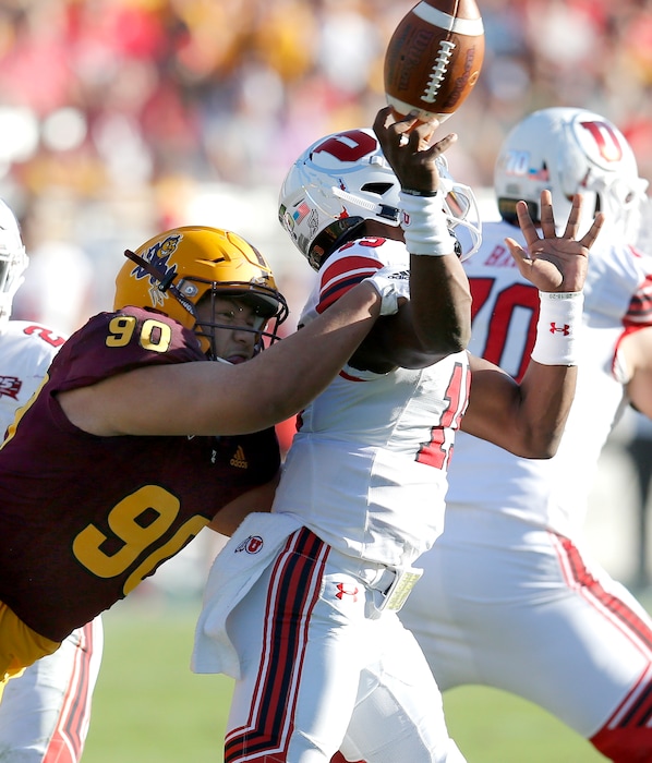 Arizona State defensive lineman Jermayne Lole (90) forces an incompletion by Utah quarterback Jason Shelley (15) in the second half during an NCAA college football game, Saturday, Nov. 3, 2018, in Tempe, Ariz. (AP Photo/Rick Scuteri)