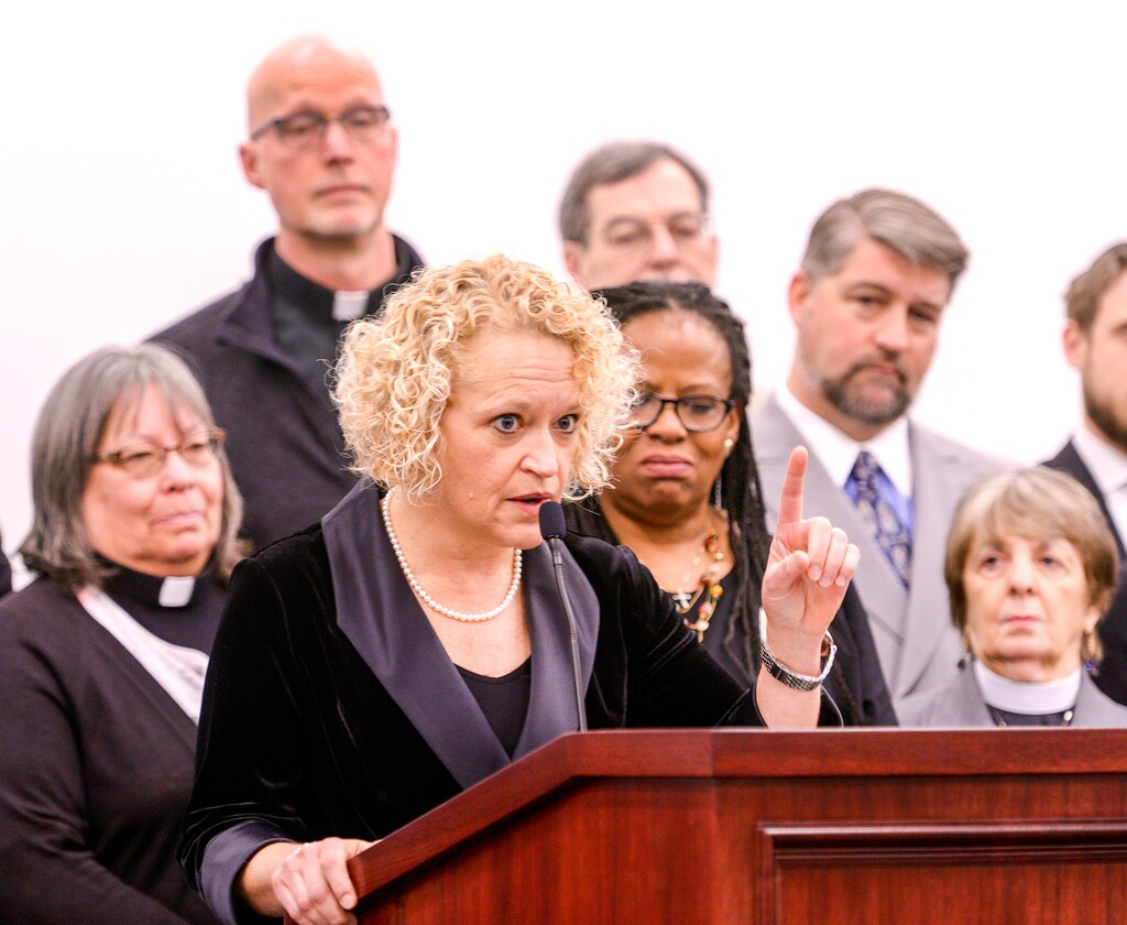 (Leah Hogsten | The Salt Lake Tribune) Salt Lake valley faith and community leaders joined Mayor Jackie Biskupski, center, Jan. 31, 2019 at the State Office Building demanding full Medicaid expansion, as approved by voters, not the Legislature's push for a different plan, namely SB96 sponsored by Sen. Allen Christensen, R-North Ogden. The replacement proposal is functionally similar to the partial Medicaid expansion plan approved by lawmakers last year, which was superseded by the public vote on Proposition 3. In addition to a more narrow pool of eligibility compared to full expansion, Christensen's bill would impose work requirements on beneficiaries, and would establish an enrollment cap to protect the state against runaway health-care costs.